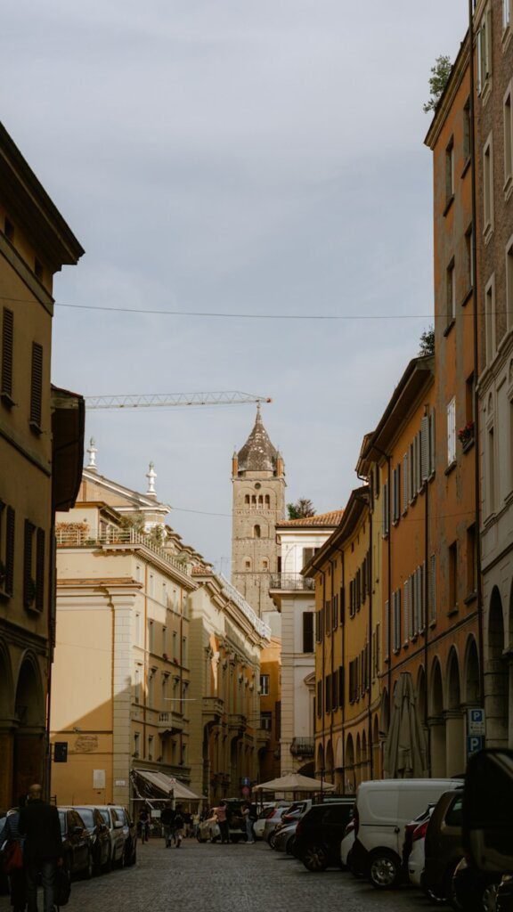 a street with cars and buildings on either side of it